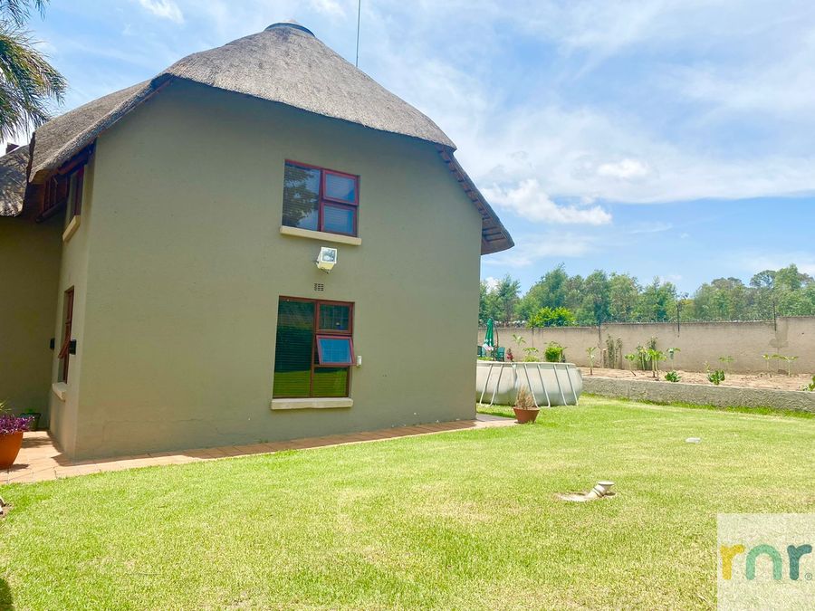 A Spacious farm style Home with Beautiful Gardens - Photo 3